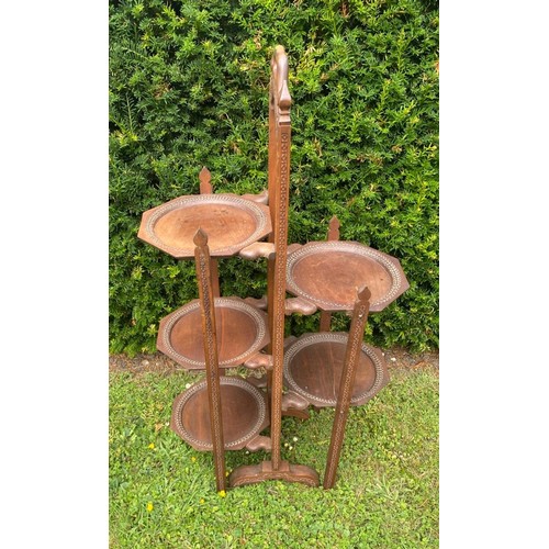 705 - A c.1900 far eastern collapsible tea and cake stand in teak / All lots are located at The Barn, Hamp... 