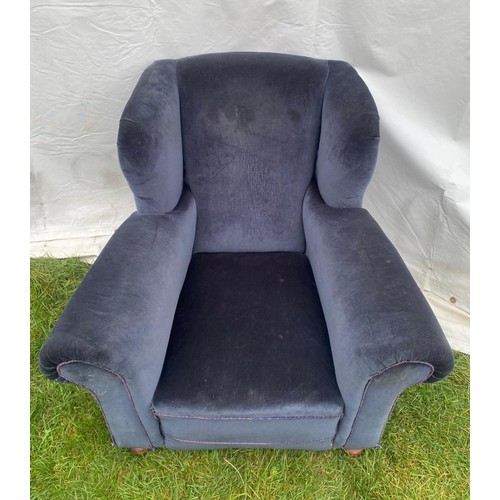 711 - Early 20th century deep seated gentleman's armchair of large proportions, extremely comfortable, cov... 