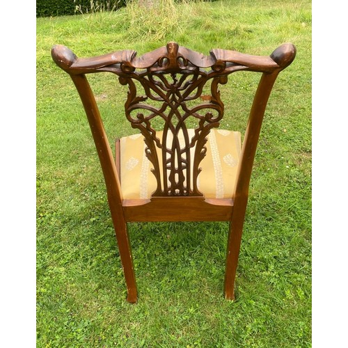 713 - A set of six 20th century Chippendale style ribbon backed dining chairs, with gold upholstered drop-... 