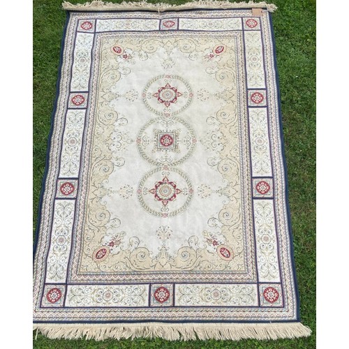 715 - A decorative woven rug / All lots are located at The Barn, Hampstead Farm, Nr Henley on Thames, Oxfo... 