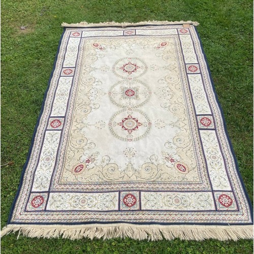 715 - A decorative woven rug / All lots are located at The Barn, Hampstead Farm, Nr Henley on Thames, Oxfo... 