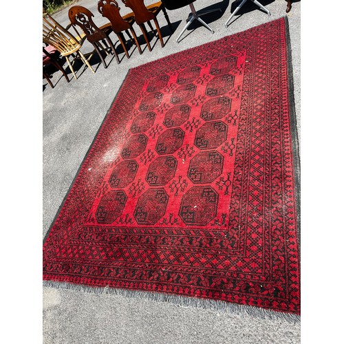 716 - A very large 19th century Persian rug, slightly worn in areas / All lots are located at The Barn, Ha... 