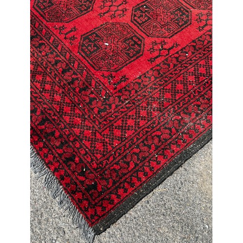 716 - A very large 19th century Persian rug, slightly worn in areas / All lots are located at The Barn, Ha... 