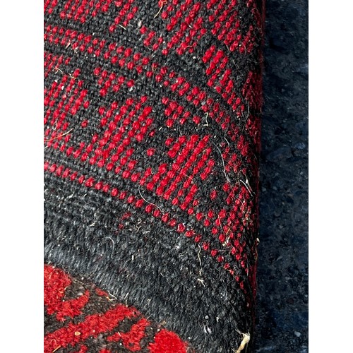 716 - A very large 19th century Persian rug, slightly worn in areas / All lots are located at The Barn, Ha... 