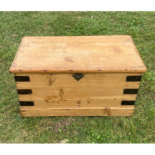 933 - A 19th century pine blanket box with natural worked strap construction / All lots are located at The... 