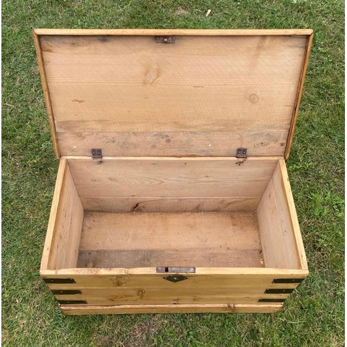 933 - A 19th century pine blanket box with natural worked strap construction / All lots are located at The... 