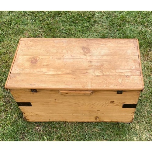 933 - A 19th century pine blanket box with natural worked strap construction / All lots are located at The... 