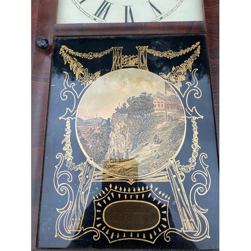 937 - An American flamed mahogany wall clock / All lots are located at The Barn, Hampstead Farm, Nr Henley... 