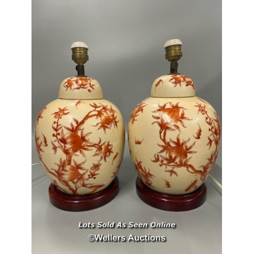 10 - A pair of large Hong Kong Arts ginger jar lamps, decorated with orange foliage, both 36cm high inclu... 