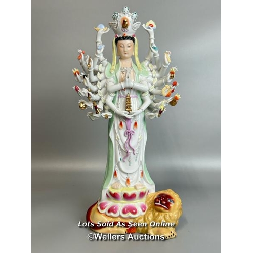 12 - A large porcelain figurine of a goddess 