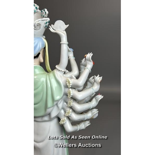 12 - A large porcelain figurine of a goddess 