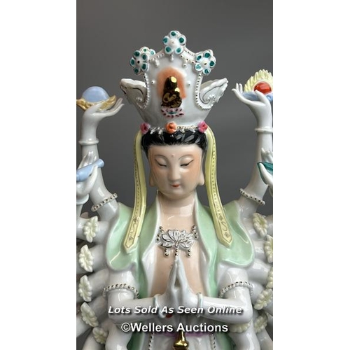 12 - A large porcelain figurine of a goddess 