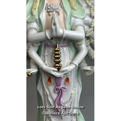 12 - A large porcelain figurine of a goddess 