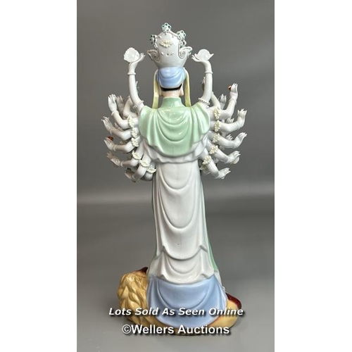 12 - A large porcelain figurine of a goddess 