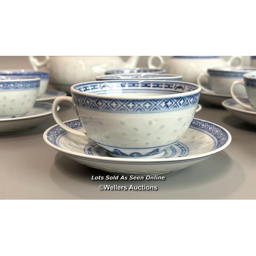 4 - A Chinese blue & white part tea service of ten cups, twelve saucers, tea pot, sugar bowl and jar wit... 