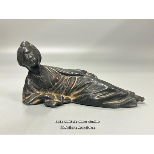 22 - A Japanese bronze reclining lady, impressed marks to the base, 11cm long, 5cm high / AN4