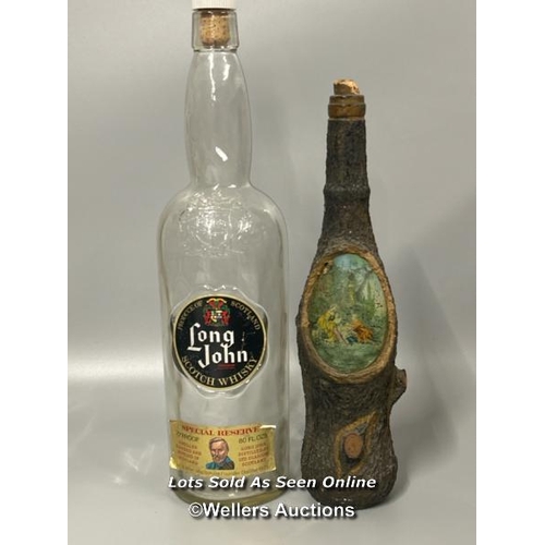 31 - Large empty Long John Scotch Whisky bottle with an empty wine bottle covered with paper mache to loo... 