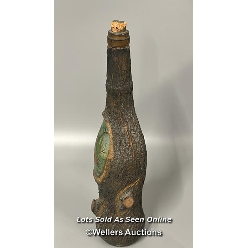 31 - Large empty Long John Scotch Whisky bottle with an empty wine bottle covered with paper mache to loo... 