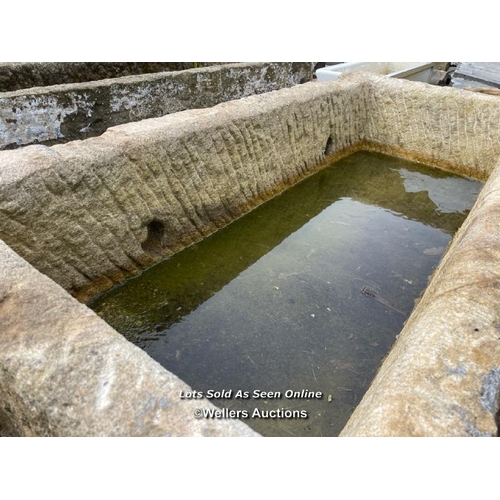 695 - A large gritstone quarry trough, 45 h x 170 l x 76cm w