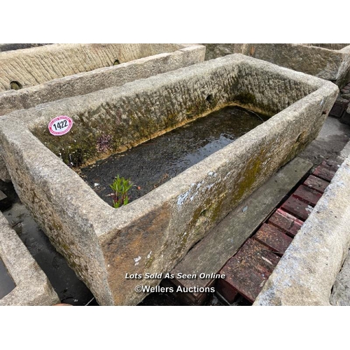 696 - A large gristone quarry trough, 45 h x 170 l x 76cm w