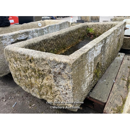 696 - A large gristone quarry trough, 45 h x 170 l x 76cm w