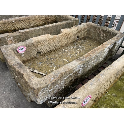 698 - A large gristone quarry trough, 45 h x 170 l x 76cm w