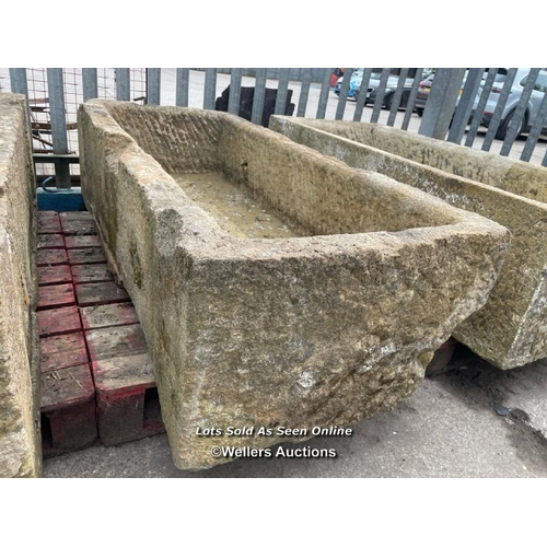 698 - A large gristone quarry trough, 45 h x 170 l x 76cm w