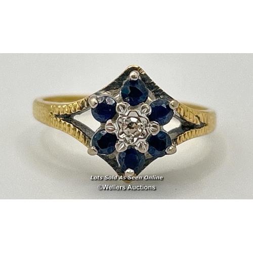 302 - Sapphire and diamond cluster ring with textured split shoulders in hallmarked 18ct gold, 1973. Ring ... 