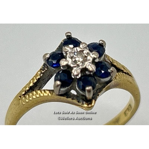 302 - Sapphire and diamond cluster ring with textured split shoulders in hallmarked 18ct gold, 1973. Ring ... 