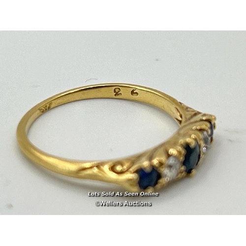 304 - A sapphire and diamond five stone carved style band in yellow metal stamped 18 and tested as 18ct go... 