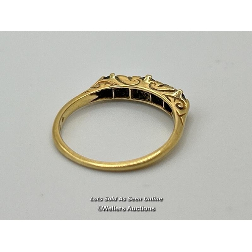 304 - A sapphire and diamond five stone carved style band in yellow metal stamped 18 and tested as 18ct go... 