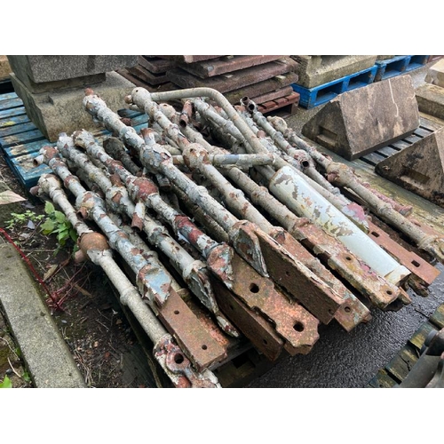 143 - X15 Painted cast iron steps and large quantity of cast iron ballustrade spindles from an old victori... 