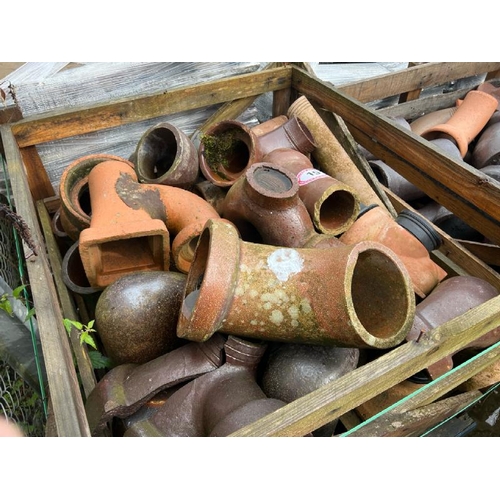 15 - A large quantity of salt glazed and terracotta pipework and components, various measurements and sty... 