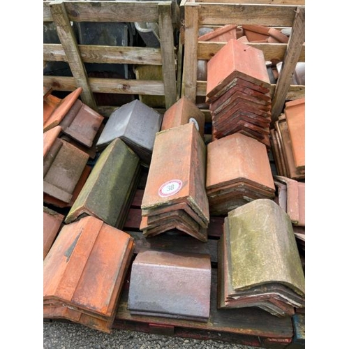 38 - Approx. x50 mixed ridge tiles inc. blue, salt glazed and terracotta, various sizes and styles