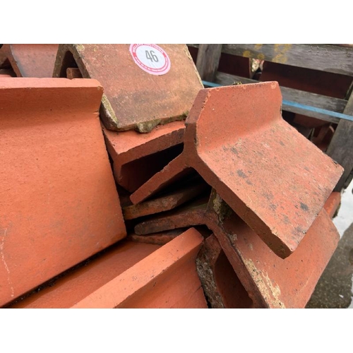 46 - Approx. x50 terracotta ridge tiles. Sizes and styles vary, roughly 30cm l