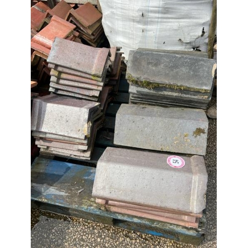 54 - Pallet of approx. x50 mixed blue and salt glazed ridge tiles, sizes and angles vary.