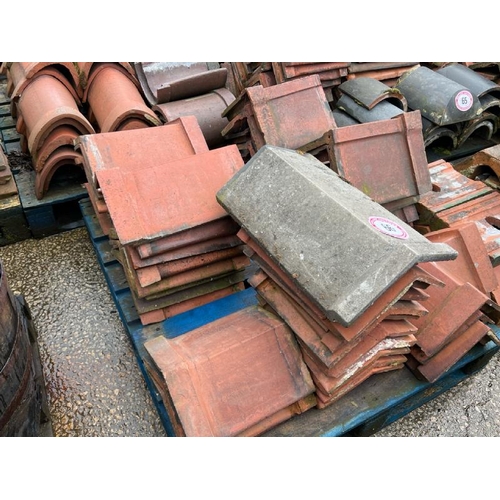 66 - Pallet of approx. x40 assorted ridge roof tiles. Sizes and angles vary.