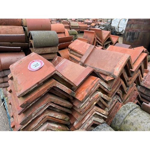 74 - Pallet of approx. x80 assorted red ridge roof tiles, sizes and angles vary