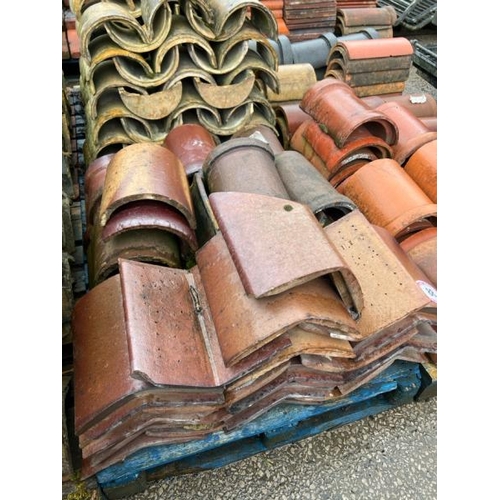 88 - Pallet of approx. x40 salt glazed ridge and half round roof tiles, sizes, styles and angles may vary