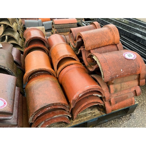 89 - Pallet of approx. x50 assorted terracotta ridge and half round roof tiles, sizes and styles may vary