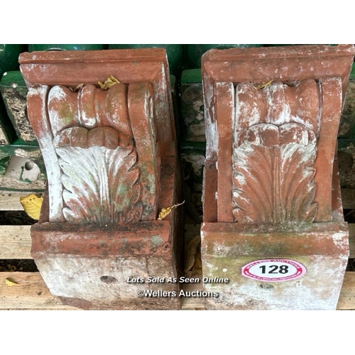 128 - Pair of terracotta corbels, 26cm (h) x 24cm (w) x 45cm (d) / Please bring equipment and labour to as... 