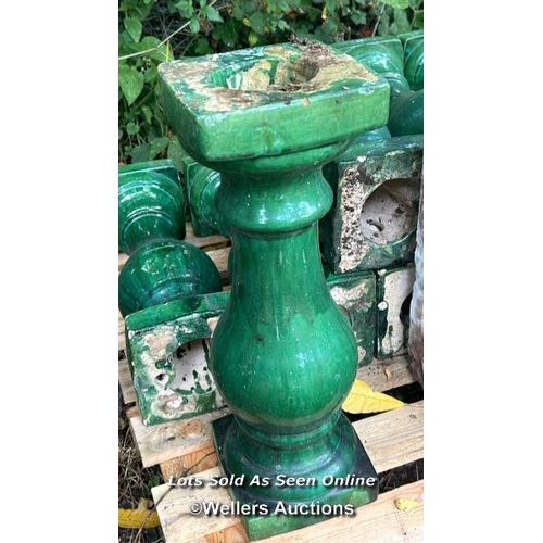 129 - Twelve glazed balustrade spindles, 49cm (h) / Please bring equipment and labour to assist with remov... 