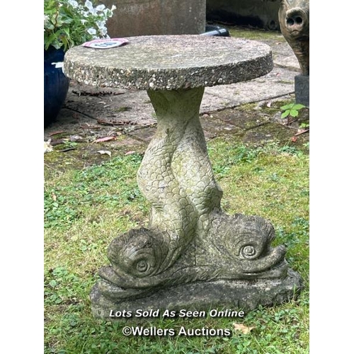 140 - Reconstituted stone coffee table on tri-form dolphin base, 50cm (h) x 38cm (dia) / Please bring equi... 