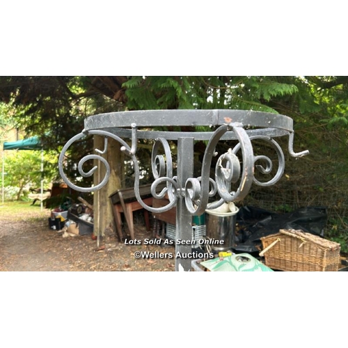 147 - Wrought iron stand, 110cm (h) x 45cm (w) / Please bring equipment and labour to assist with removal ... 