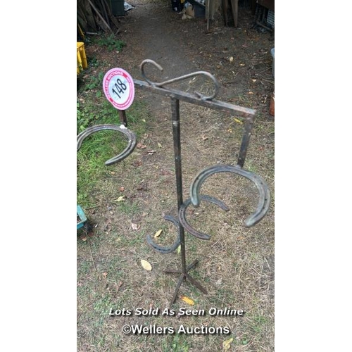 148 - Three tier horse shoe plant stand, 103cm (h) / Please bring equipment and labour to assist with remo... 