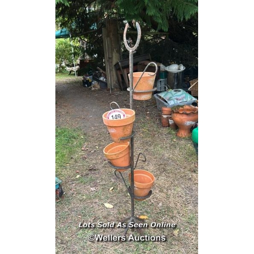 149 - Four tier horse shoe plant stand, with associated pots, 115cm (h)  / Please bring equipment and labo... 