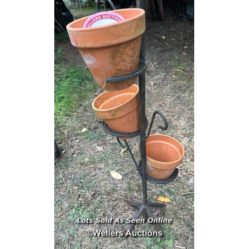 149 - Four tier horse shoe plant stand, with associated pots, 115cm (h)  / Please bring equipment and labo... 