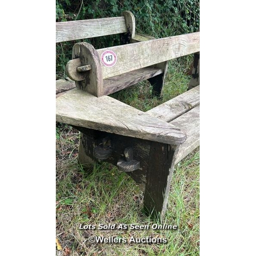 167 - Rustic elm garden bench, 74cm (h) x 180cm (w) x 62cm (d) / Please bring equipment and labour to assi... 