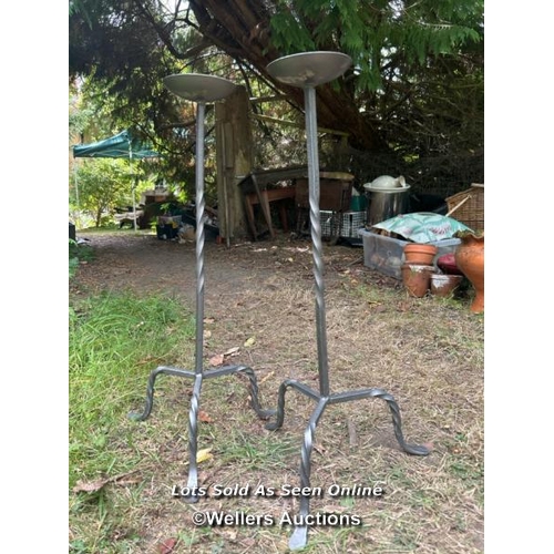 180 - Pair of wrought iron candle holders, 69cm (h) / Please bring equipment and labour to assist with rem... 