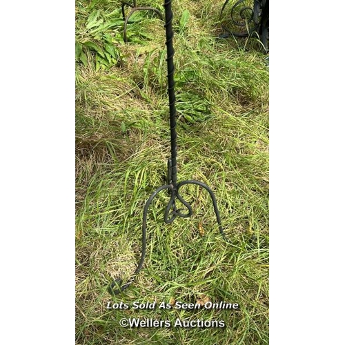 184 - Six arm wrought iron candle holder stand, 146cm (h) / Please bring equipment and labour to assist wi... 